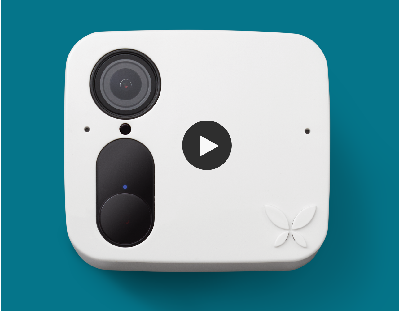 Ooma Smart Camera image with play button overlay